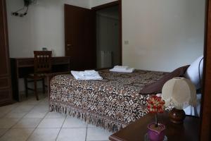 Posteľ alebo postele v izbe v ubytovaní B&B Severini