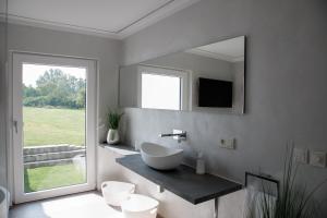 Posezení v ubytování Einzigartiges Loft von Loftalive