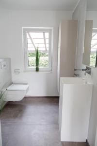 Koupelna v ubytování Einzigartiges Loft von Loftalive