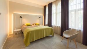 Postel nebo postele na pokoji v ubytování Park Hotel Viljandi