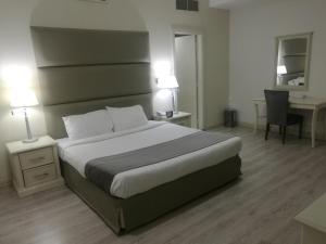 Кровать или кровати в номере Mirador Hotel
