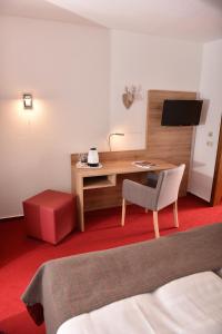 TV a/nebo společenská místnost v ubytování Hotel Kaiserpfalz