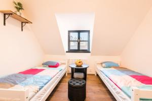 Postel nebo postele na pokoji v ubytování Apart-Hostel ZERO
