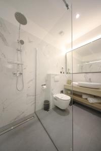 Kúpeľňa v ubytovaní Teatro Verdi Boutique Hotel + 37 fotografií