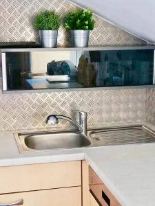 Una cocina o cocineta en HOTEL Jerolitsch