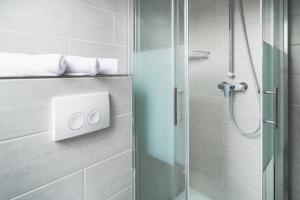 Ein Badezimmer in der Unterkunft Aparthotel Lenau