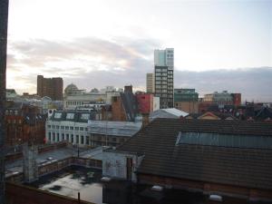a view of a city skyline with buildings at Stay for longer on cheap rates 15 in Manchester