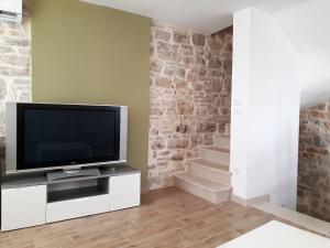 TV a/nebo společenská místnost v ubytování Barbiere Guest House