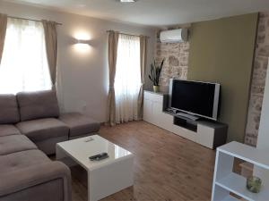 TV a/nebo společenská místnost v ubytování Barbiere Guest House