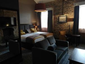 The Old Borough Hotel - Wetherspoon客房内的一张或多张床位