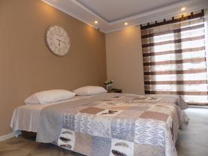 Ένα ή περισσότερα κρεβάτια σε δωμάτιο στο Apartman Bogić