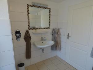 Koupelna v ubytování Ferienhaus Tamm-Voß + 37 fotografií