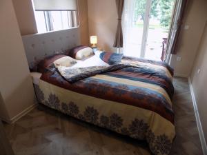Ένα ή περισσότερα κρεβάτια σε δωμάτιο στο Apartman Bogić