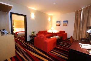 Coin salon dans l'établissement Nehal Hotel