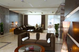Coin salon dans l'établissement Nehal Hotel