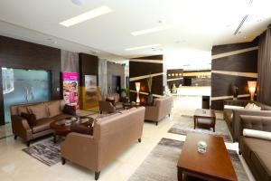 Coin salon dans l'établissement Nehal Hotel