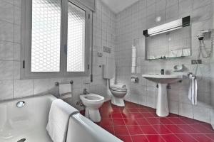 Ванная комната в Hotel Grand Torino