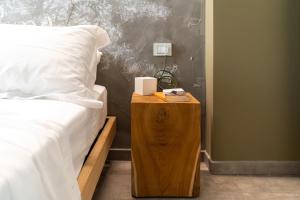 A bed or beds in a room at B&B Dei Poeti