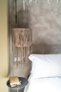 A bed or beds in a room at B&B Dei Poeti