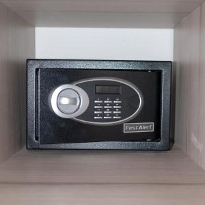 a safe with a first alert on a shelf at Two Keys in Torreón