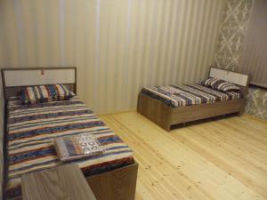 Postel nebo postele na pokoji v ubytování VM Hostel