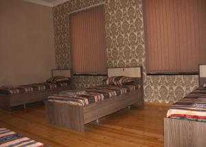 Postel nebo postele na pokoji v ubytování VM Hostel