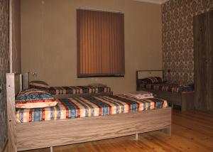 Postel nebo postele na pokoji v ubytování VM Hostel