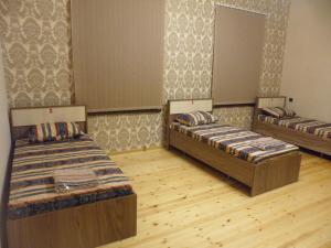 Postel nebo postele na pokoji v ubytování VM Hostel