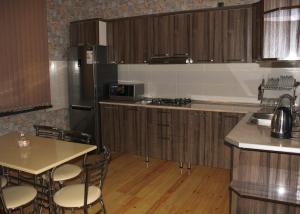 Kuchyň nebo kuchyňský kout v ubytování VM Hostel