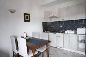 Kuchyň nebo kuchyňský kout v ubytování P&D Apartments