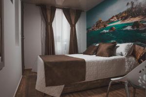 Voodi või voodid majutusasutuse HOTEl PACHAMAMA SPA toas