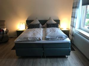 Postel nebo postele na pokoji v ubytování Nordstern + 51 fotografií