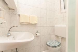 Koupelna v ubytování Apartmani Vesna