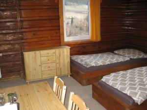 Posteľ alebo postele v izbe v ubytovaní Apartmány U Vlka