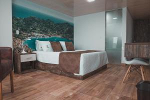 Voodi või voodid majutusasutuse HOTEl PACHAMAMA SPA toas