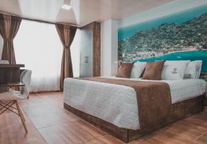 Voodi või voodid majutusasutuse HOTEl PACHAMAMA SPA toas