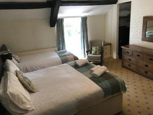 Tempat tidur dalam kamar di Aberystwyth, Pentre Farmhouse,