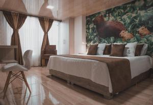 Voodi või voodid majutusasutuse HOTEl PACHAMAMA SPA toas