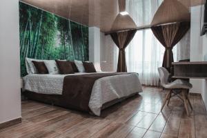 Voodi või voodid majutusasutuse HOTEl PACHAMAMA SPA toas