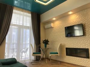 Телевизия и/или развлекателен център в Luxury Apartment in Downtown, Near River Esplanade