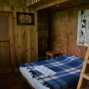 Postel nebo postele na pokoji v ubytování Utopia Eco Hotel