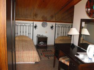 Cama o camas de una habitación en Meldi Hotel