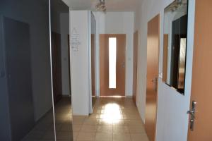 Televiisor ja/või meelelahutuskeskus majutusasutuses Apartmán Zderadova