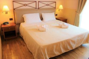 Katil atau katil-katil dalam bilik di Hotel Semifonte
