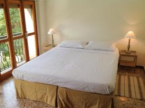 Posteľ alebo postele v izbe v ubytovaní Villa Cadenza