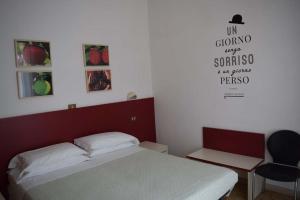 Postel nebo postele na pokoji v ubytování Eco-Hotel Edy