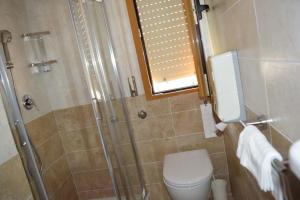 Koupelna v ubytování Eco-Hotel Edy
