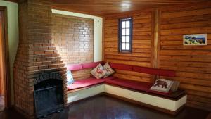 Uma área de estar em Pousada Cabanas da Serra Lumiar