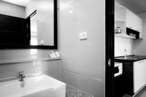 Koupelna v ubytování Phavina Hotel Rayong SHA Extra Plus