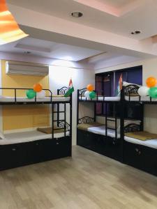 Postel nebo postele na pokoji v ubytování Bandra Dormitory Only for indian male